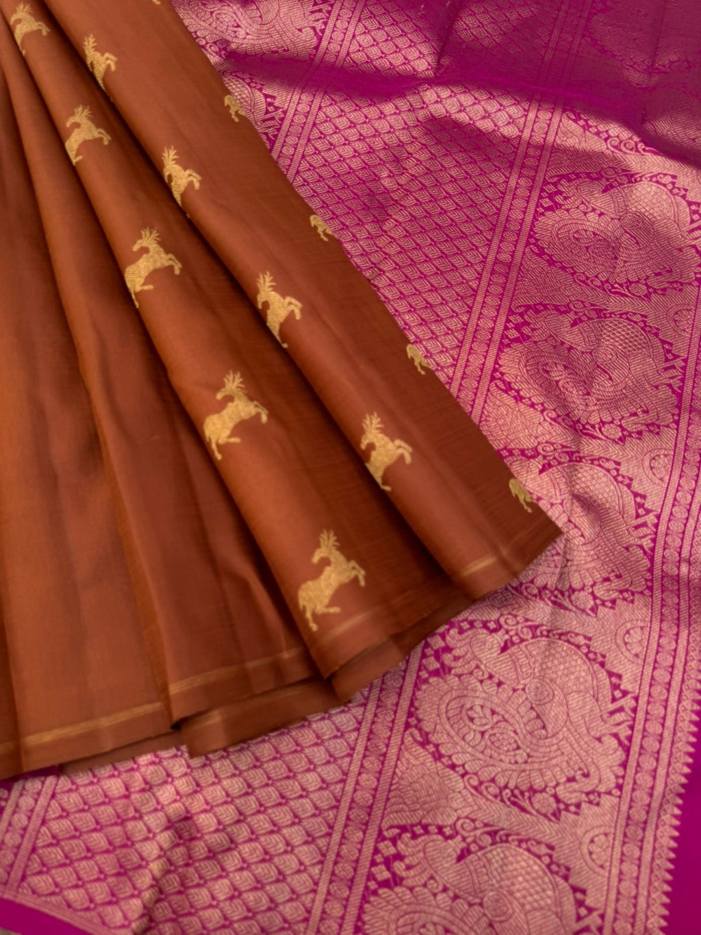 Corporate Kanchivarams - a caramel brown and pink borderless deer buttas