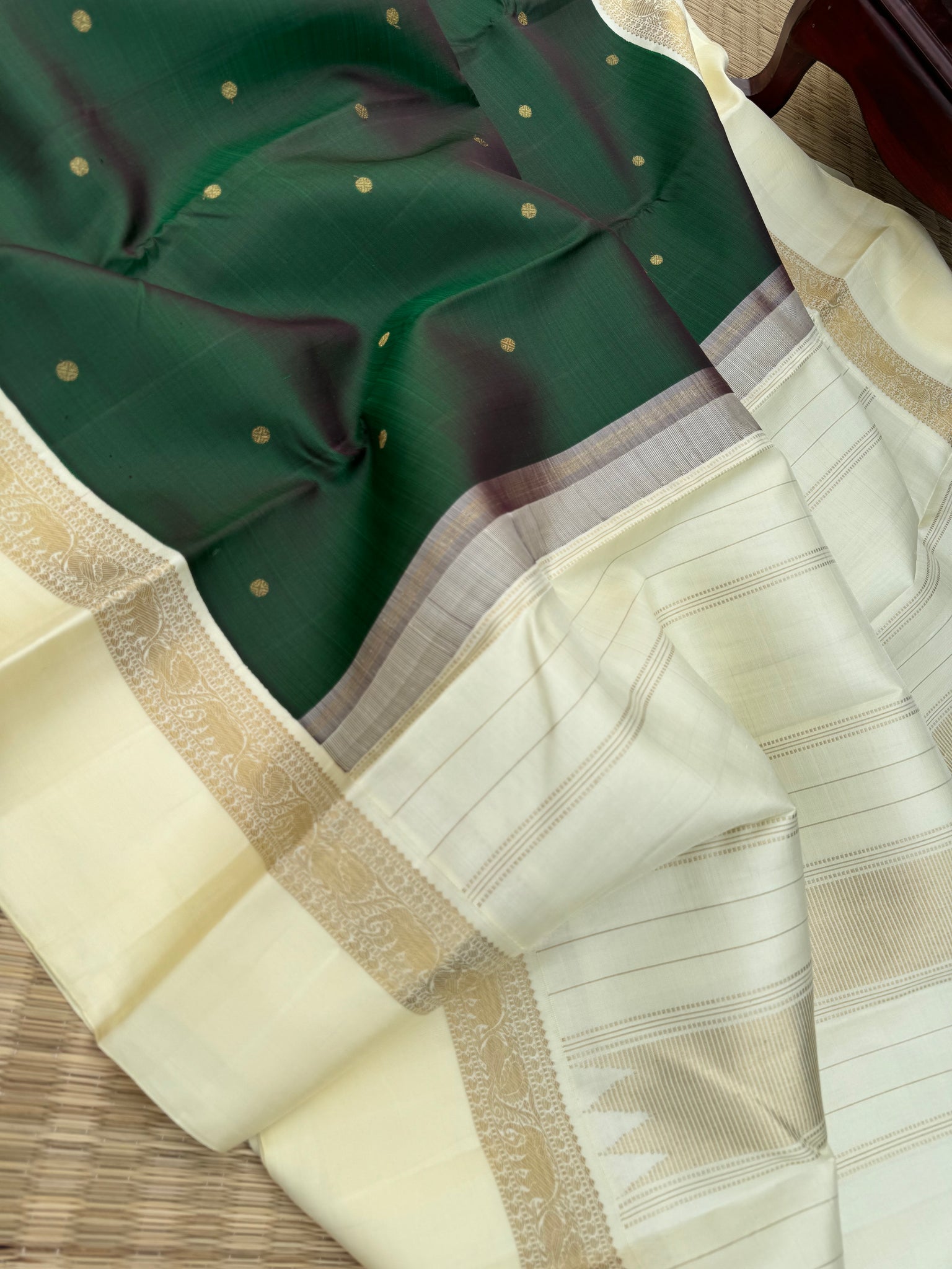 “Iyarkai” (இயற்கை) - Kanchivaram Colours Inspired from Mother Nature - a stunning deep dark bottle green and off white Korvai kanchivaram with kall erangina borders