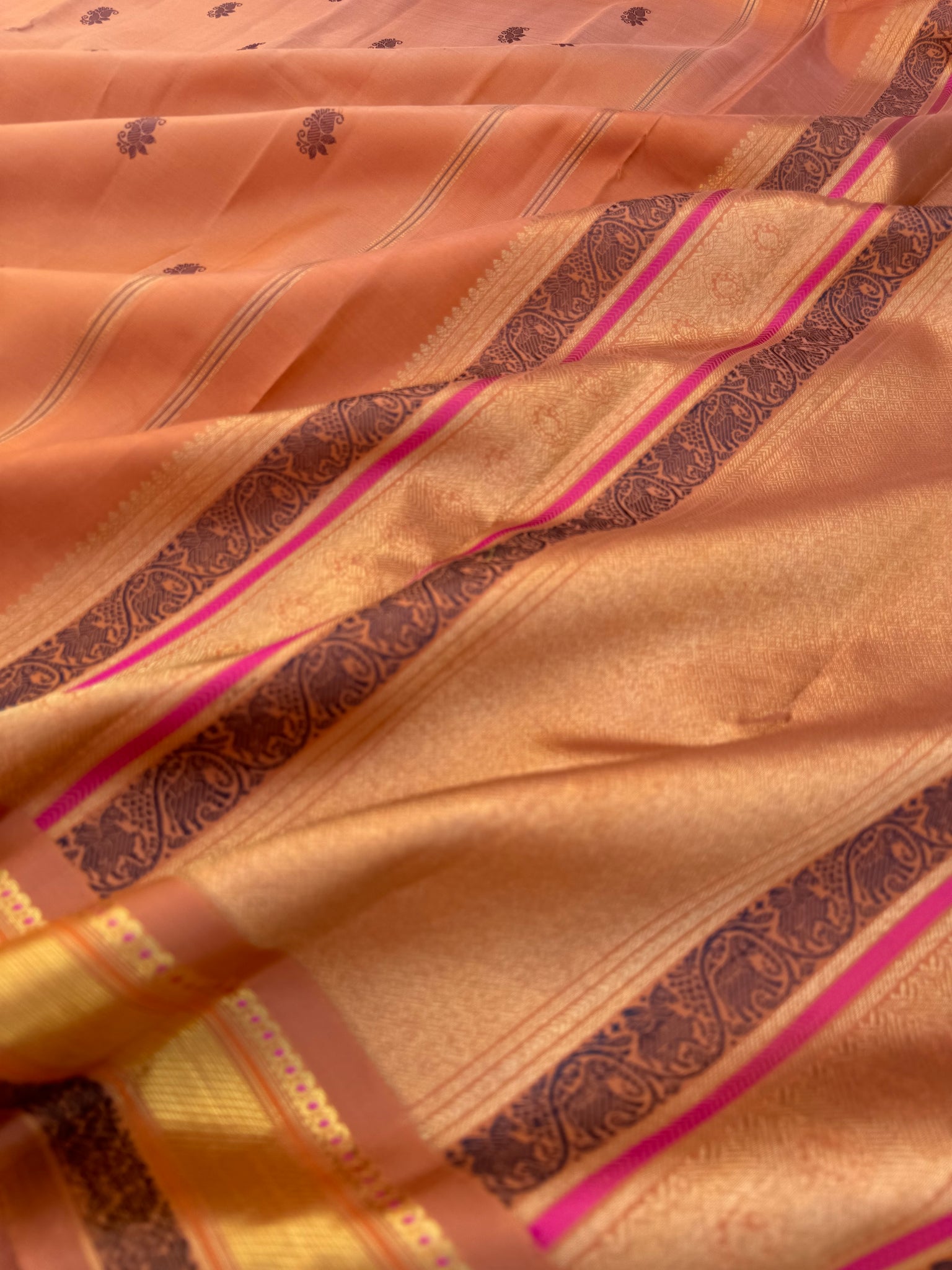 Swarnam - Kanchivarams woven for Generations - a creamy ice cream oran ...