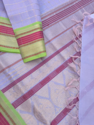 Pastels on Zari Kissed Silk Cotton - a most beautiful pastel lavender muthukattam and buttas woven together the best part is the apple green