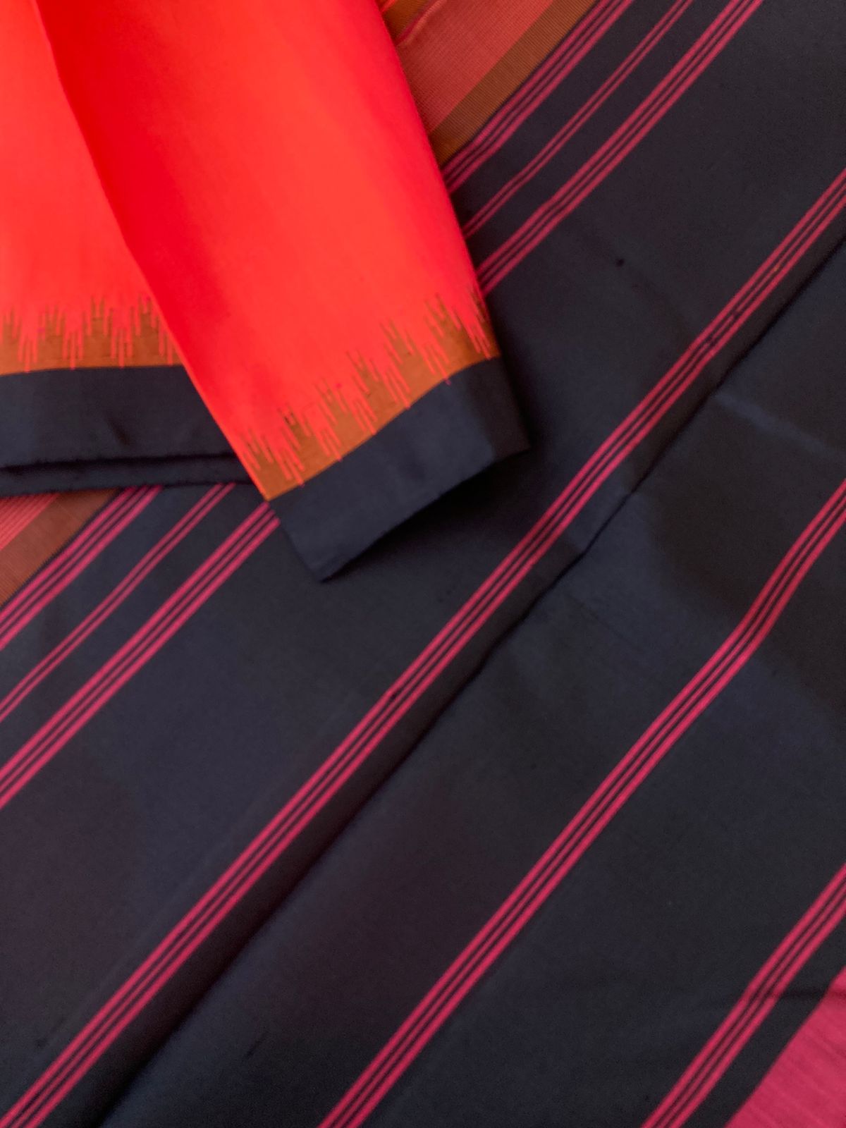 Kaavyam on Korvai Kanchivaram - beautiful vibrant kanakambaram orange and black one inch korvai no zari Kanchivaram