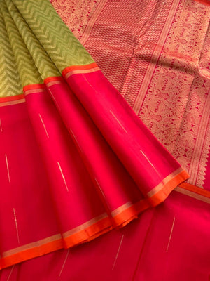 Tasteful Tall Border Kanchivarams - beautiful green and gold full body chevron V pattern with tomato red long korvai woven borders