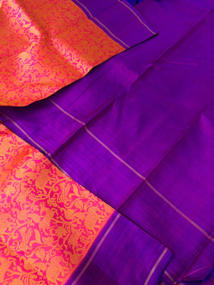 Yarn play on Kanchivaram - floral pink and mustard body vanasingaram with short violet borders pallu