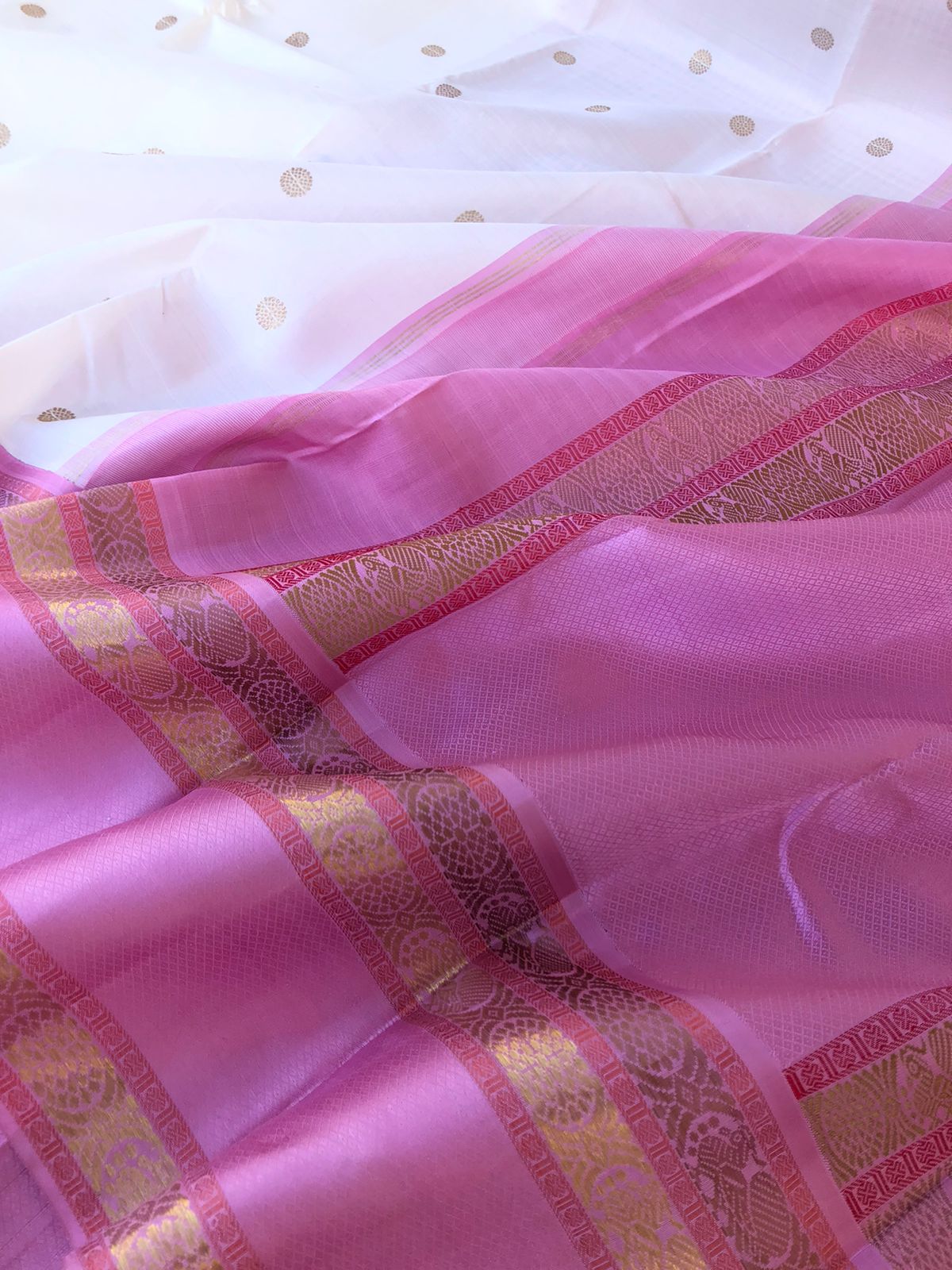 Timeless Classic Kanchivarams - stunning off white and pink korvai Kanchivaram with Lakshadeepam style woven blouse