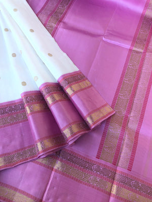 Timeless Classic Kanchivarams - stunning off white and pink korvai Kanchivaram with Lakshadeepam style woven blouse