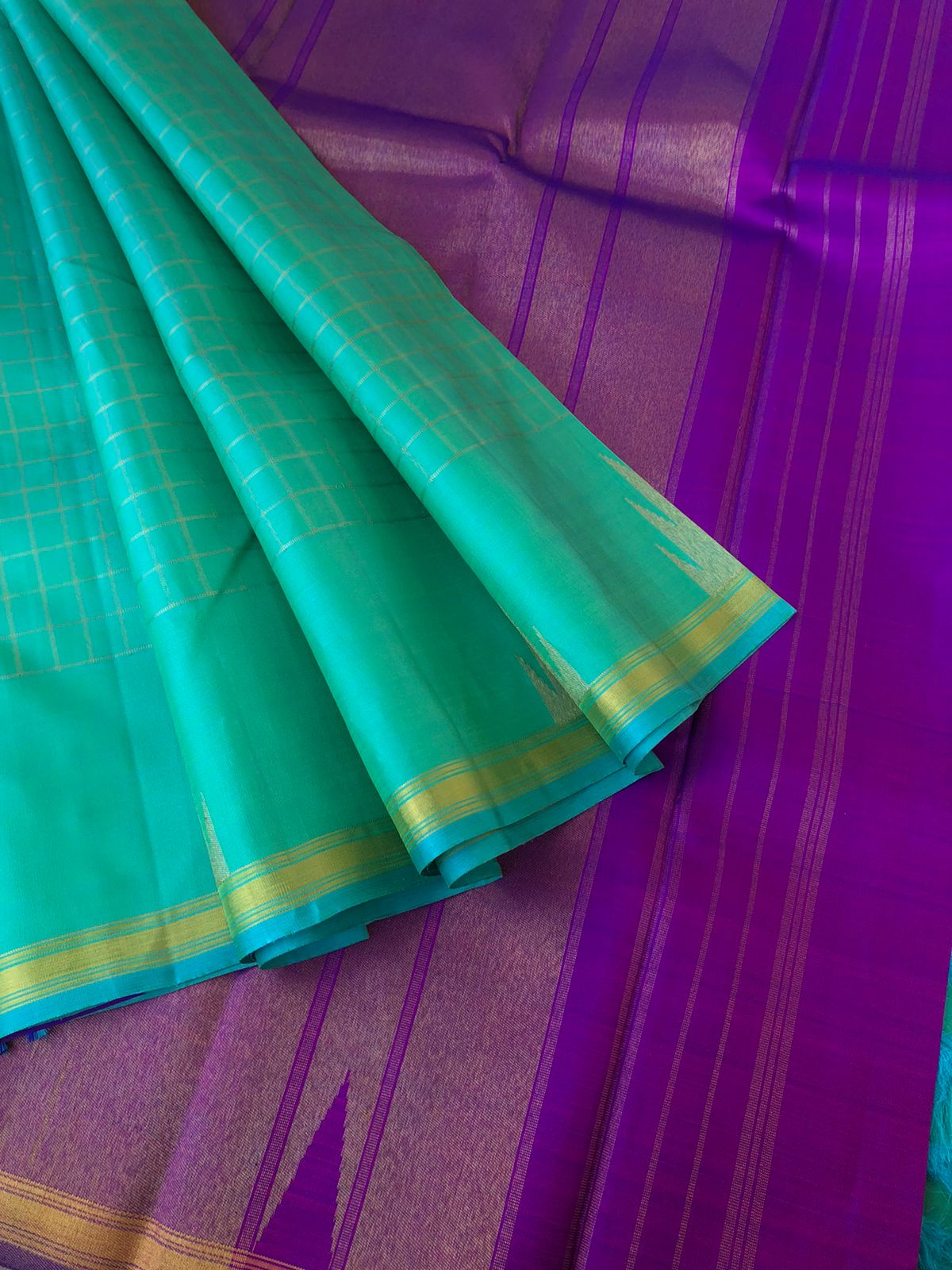 Leela - Lighter Shades on Kanchivarams - dual tone aqua blue green zari chex woven body with thalamboo buttas woven borders