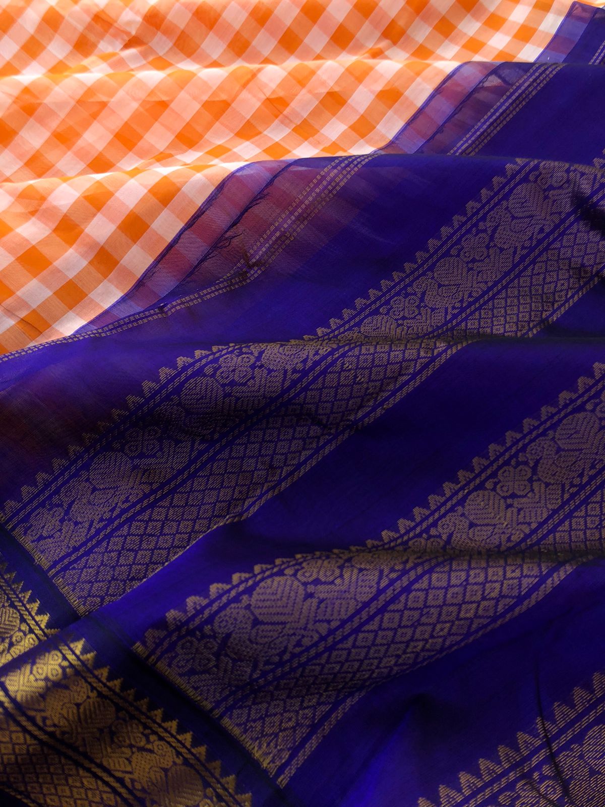 Paalum palamum kattam on Korvai Silk Cotton - off white and orange chex with ink blue borders and pallu