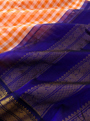 Paalum palamum kattam on Korvai Silk Cotton - off white and orange chex with ink blue borders and pallu