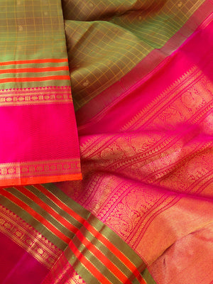 Kattams on Kanchivaram - Muthu Kattam - stunning maanthulir ( fresh mango leaf tone ) Kanchivaram with moppula borders and chex buttas woven body is absolutely traditional