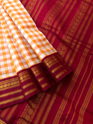 Paalum palamum kattam on Korvai Silk Cotton - off white and orange chex with maroon borders pallu and blouse