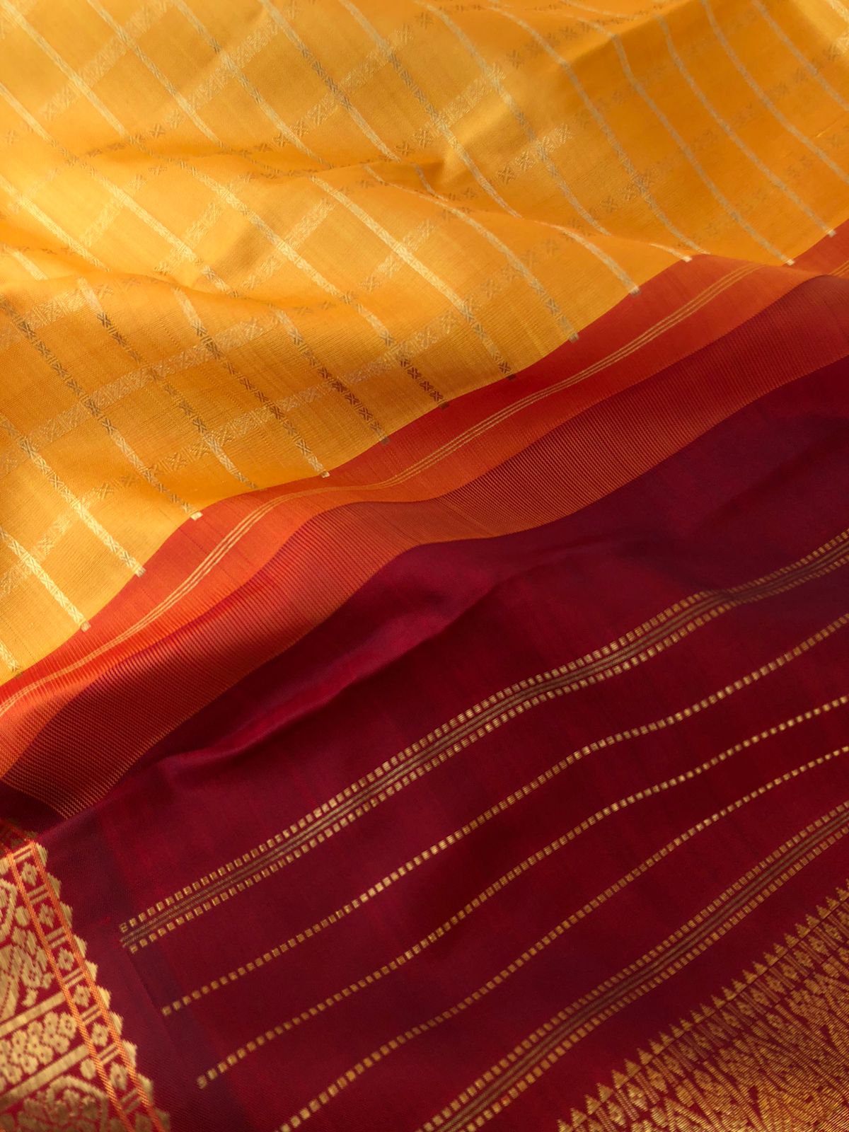 Vintage Ragas on Kanchivaram - the traditional at the best of classy mustard red and maroon with thutripoo woven chex with korvai woven retta pett borders