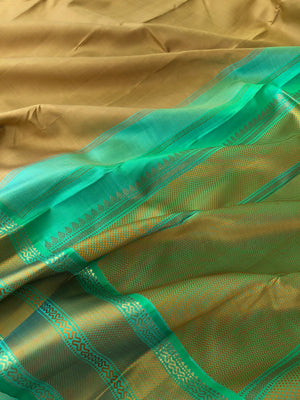 Timeless Classic Kanchivarams - no zari Kanchivaram beauty of beach sand and sandalwood tone and sea green