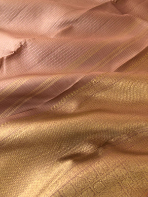 Yarn play on Kanchivaram - biscuit beige and rose gold Lakshadeepam with solid gold borders