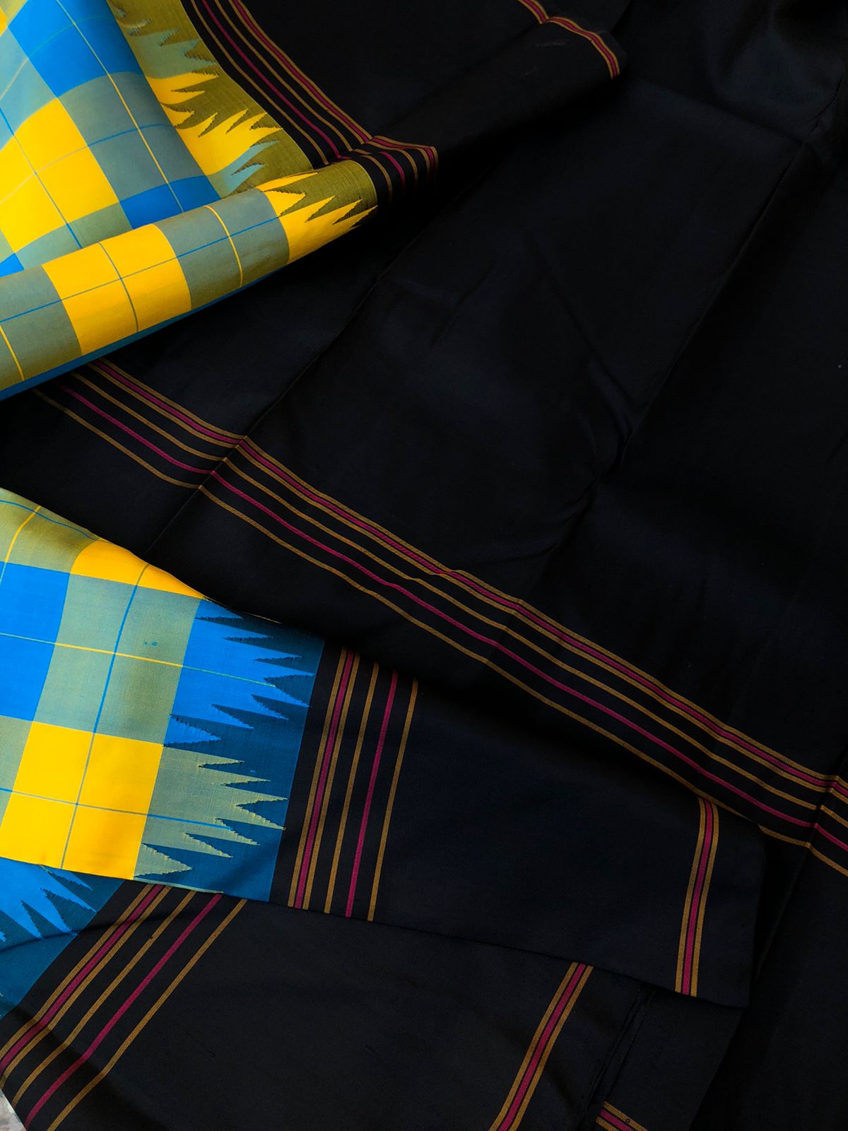 Korvai Connection on Kanchivaram - stunning blue and yellow paalum Palamum chex with black borders pallu and blouse
