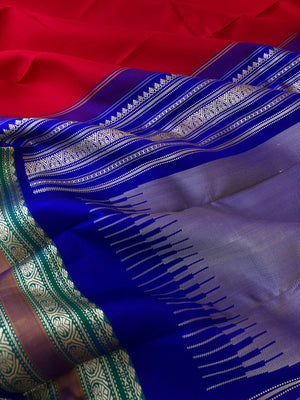 Festive Vibes on No Zari Korvai Kanchivaram - the perfect chilly red and blue with jada naagam woven motifs borders