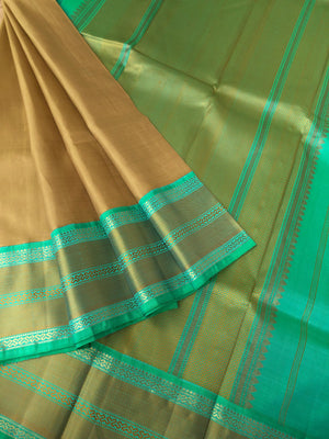 Timeless Classic Kanchivarams - no zari Kanchivaram beauty of beach sand and sandalwood tone and sea green