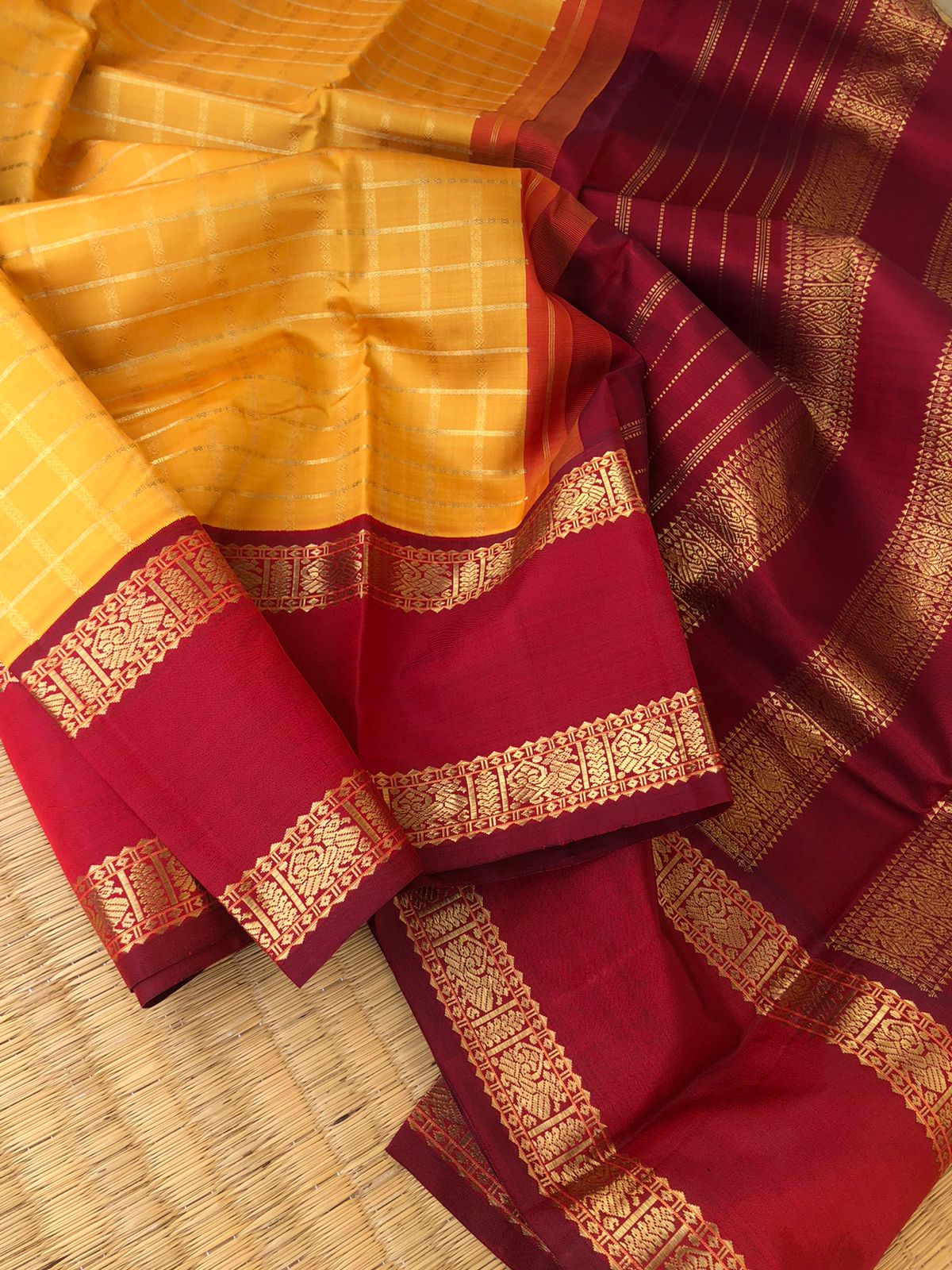 Vintage Ragas on Kanchivaram - the traditional at the best of classy mustard red and maroon with thutripoo woven chex with korvai woven retta pett borders