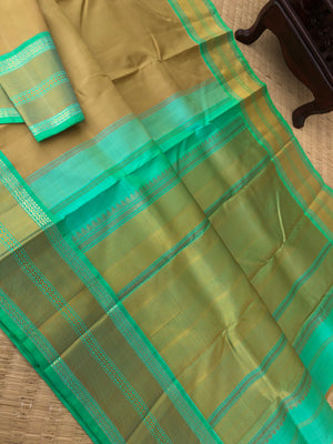 Timeless Classic Kanchivarams - no zari Kanchivaram beauty of beach sand and sandalwood tone and sea green