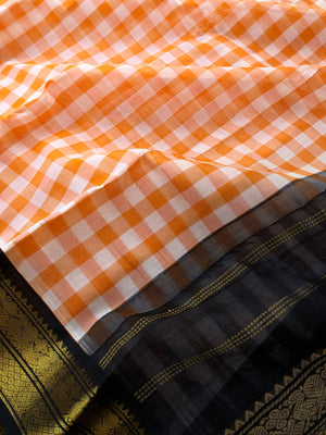 Paalum palamum kattam on Korvai Silk Cotton - off white and orange chexs with black borders pallu and blouse