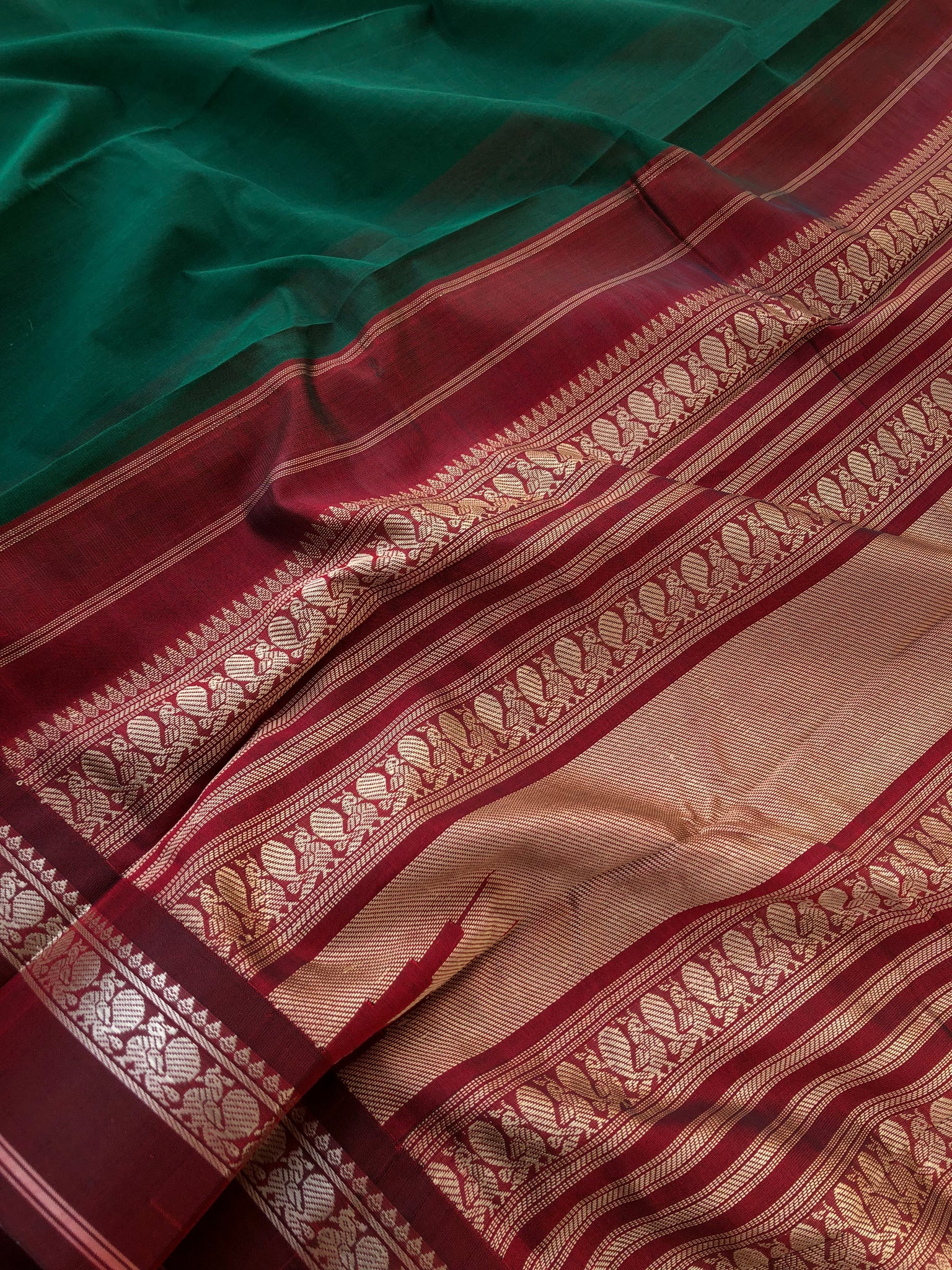 Cotton body with Pure Silk Borders - deepest Meenakshi green and maroon