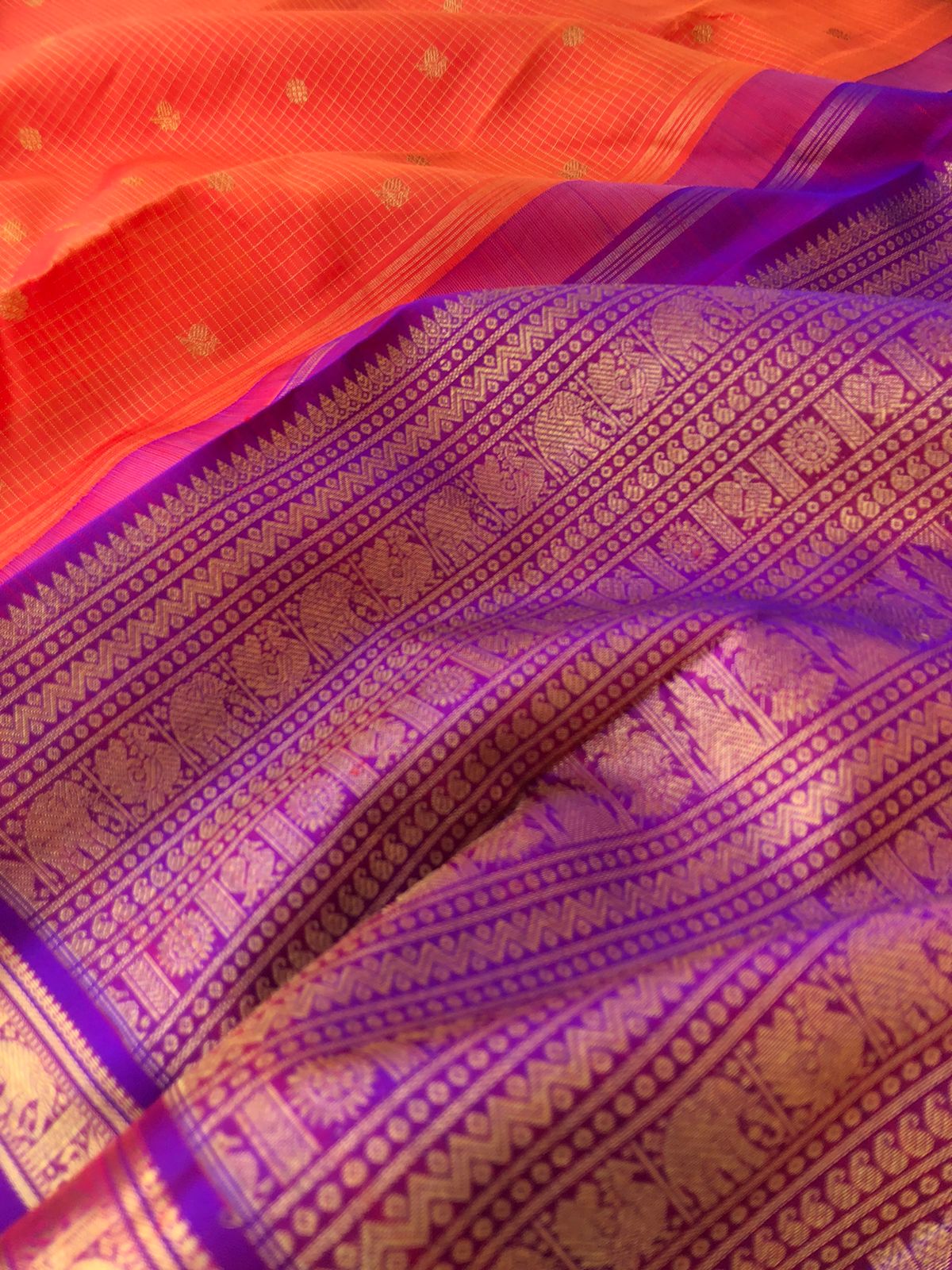 Oosi kattams on Kanchivaram - stunning orange and violet oosi kattam with horse and elephant woven rett pett borders with detailed gold zari woven pallu
