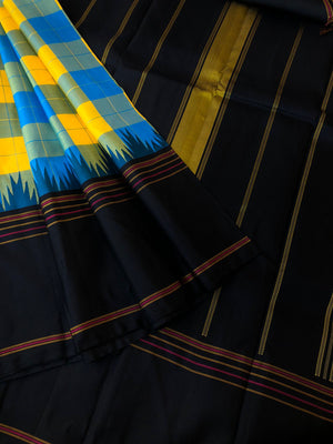 Korvai Connection on Kanchivaram - stunning blue and yellow paalum Palamum chex with black borders pallu and blouse