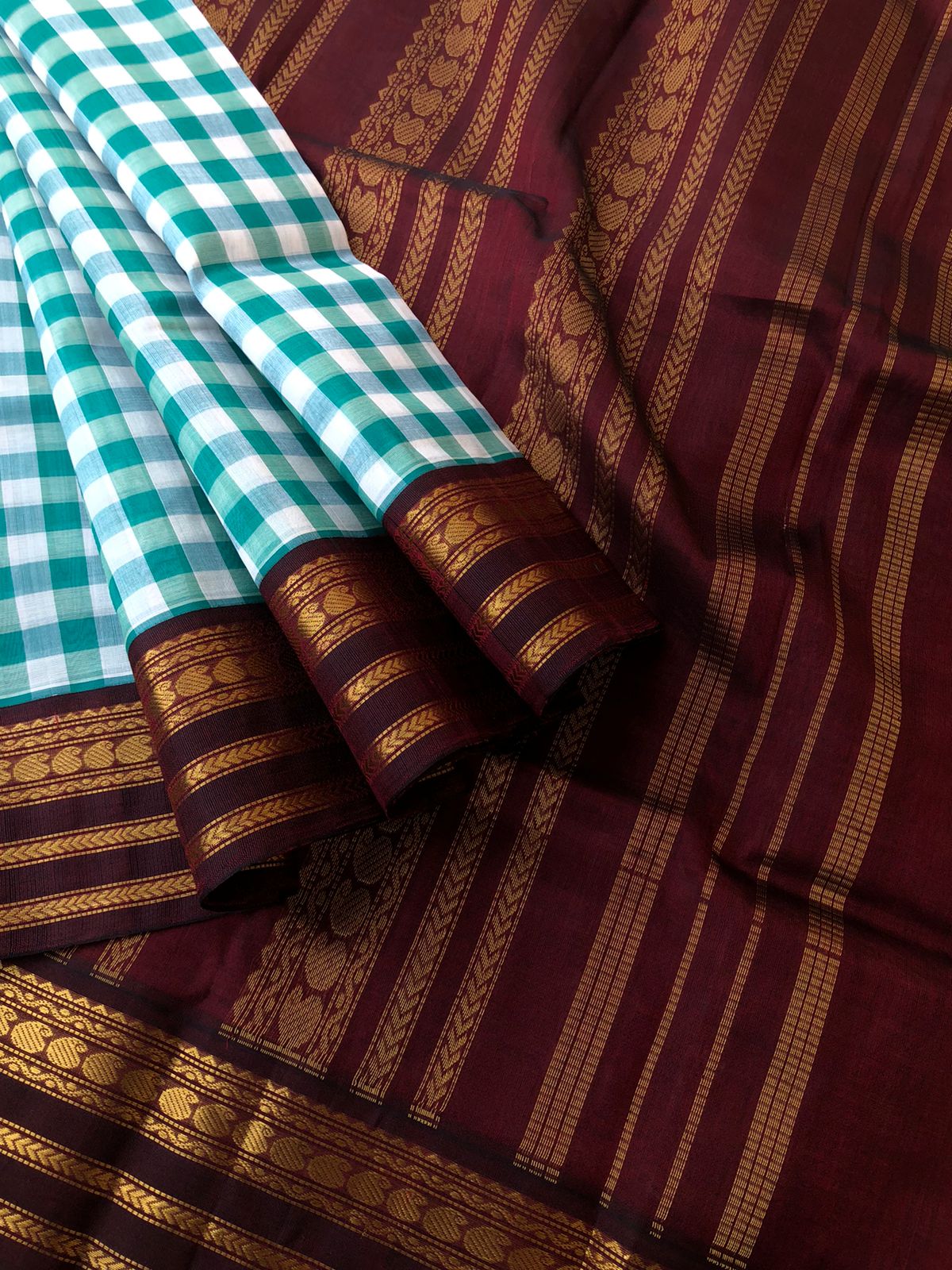 Paalum palamum kattam on Korvai Silk Cotton - off white and teal blue chex with deep maroon brown pallu and blouse