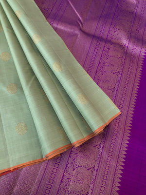Mohaa - Beautiful Borderless Kanchivarams - unusual pale pista green and short violet Irruthalaipakshi and chackaram buttas