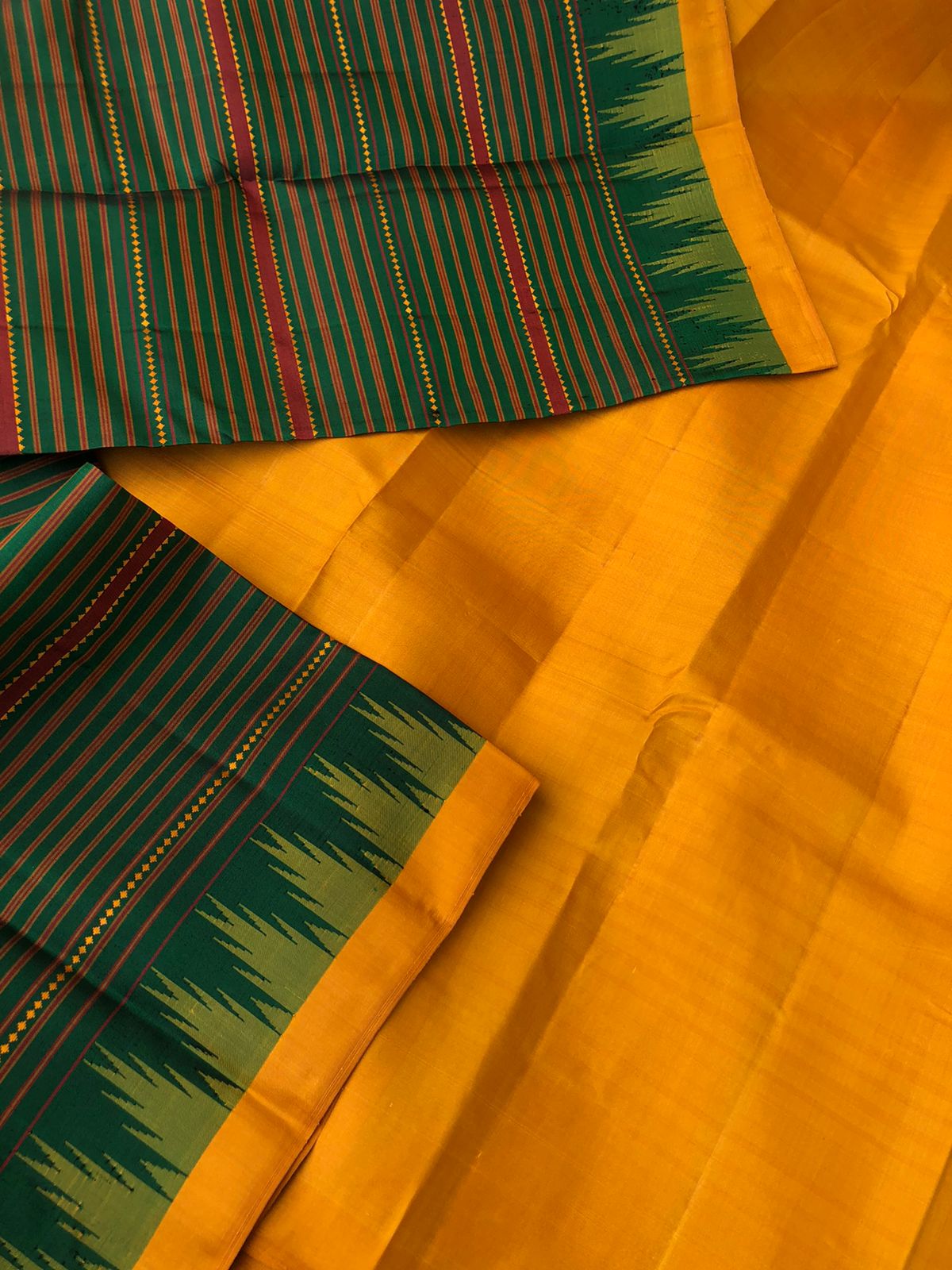 Festive Vibes on Korvai Kanchivaram - absolutely traditional deepest dark Meenakshi green and mustard muthu veldhari with small borders