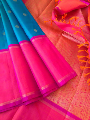 Shree - Festive Vibes on Kanchivaram - teal blue with orange short pink broad korvai borders
