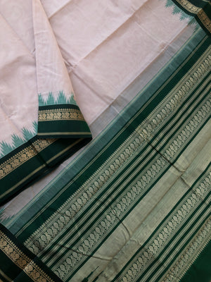 Cotton body with Pure Silk Borders - beige and deepest Meenakshi green is at the most beautiful