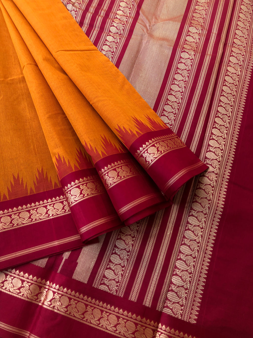 Cotton body with Pure Silk Borders - turmeric and deep red is a gorgeous traditional combination
