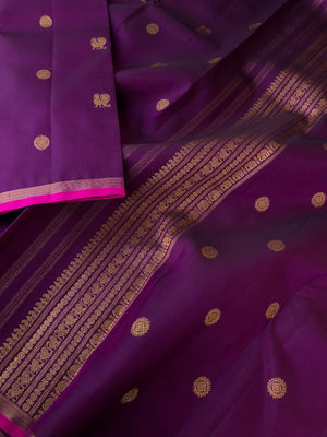 Mohaa - Beautiful Borderless Kanchivarams - one of kind deepest purple mayil chackaram woven buttas with pink sleeve edge and best part is contrasting mustard blouse
