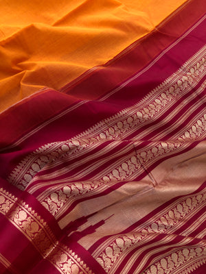 Cotton body with Pure Silk Borders - turmeric and deep red is a gorgeous traditional combination