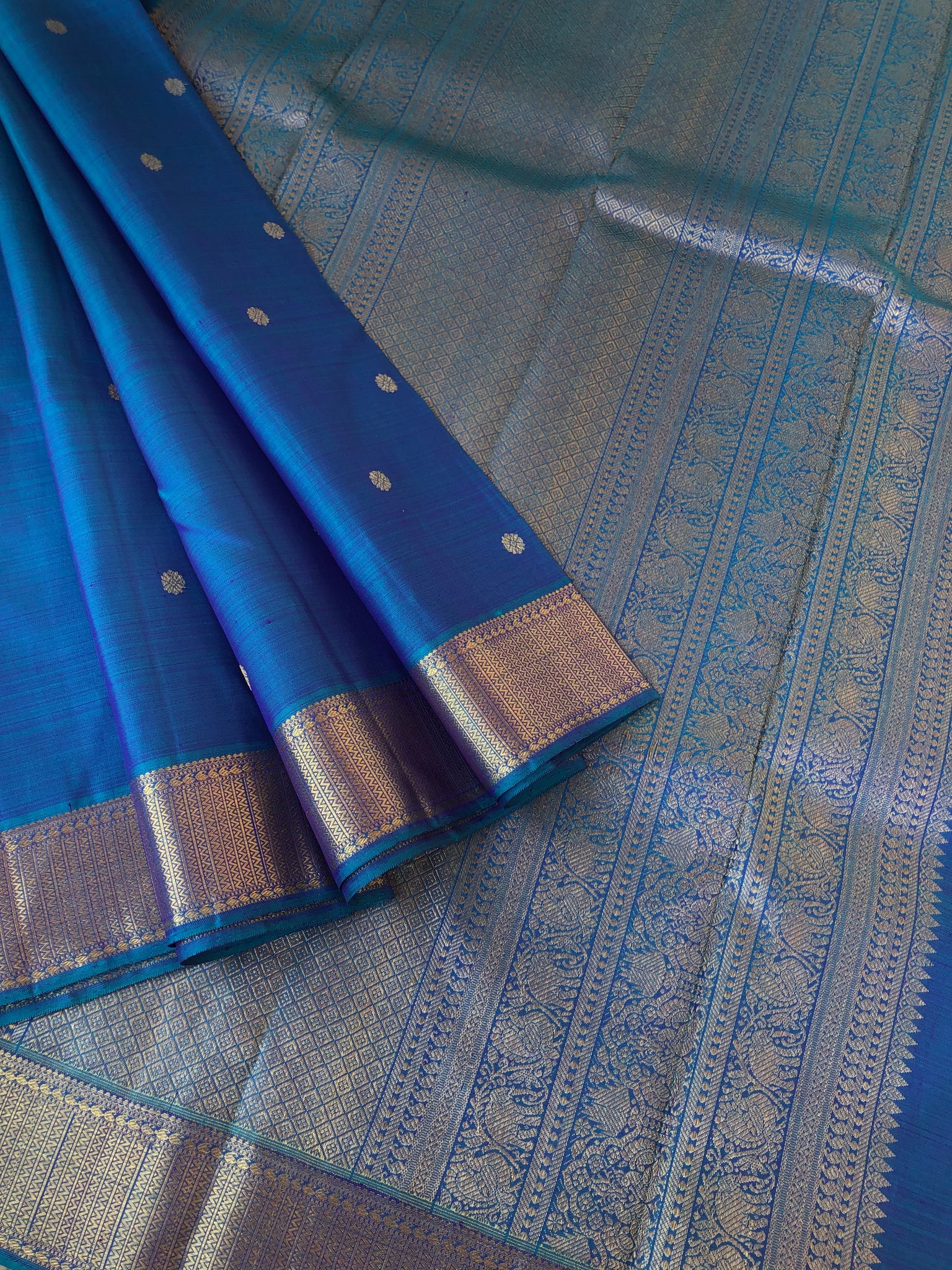 Solid Kanchivarams - stunning blue on blue and gold Kanchivaram with intricate woven pallu