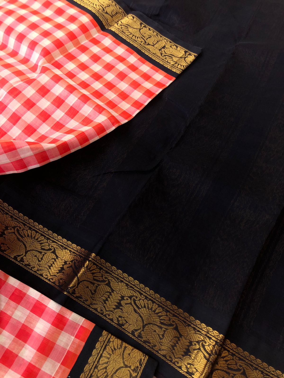 Paalum palamum kattam on Korvai Silk Cotton - off and red chex with black borders and pallu