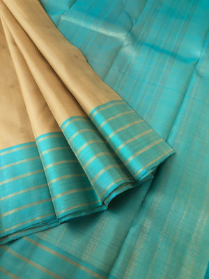 Corporate Kanchivarams - creamy butter tone body with aqua blue pallu and blouse