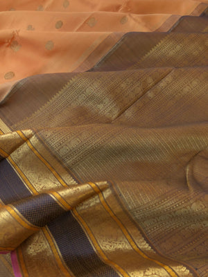 Leela - Lighter Shades on Kanchivarams - creamish sandal orange with elephant woven borders with intricate gold zari woven pallu