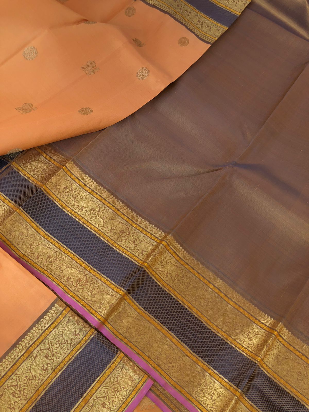 Leela - Lighter Shades on Kanchivarams - creamish sandal orange with elephant woven borders with intricate gold zari woven pallu
