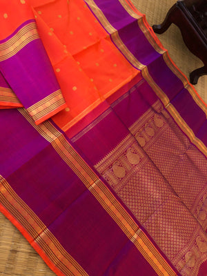 Kamakshi- Traditional Kanchivarams - the best of orange and purple broad borders Kanchivaram with stunning gold zari woven pallu