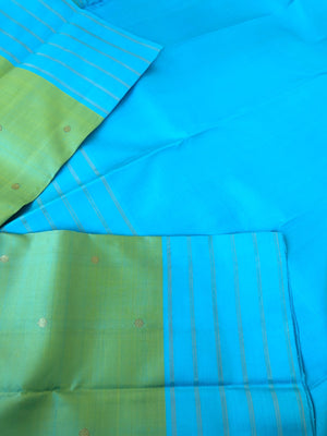 Kaviyam on Kanchivaram - gorgeous dual tone aqua green blue with kamalam buttas woven body
