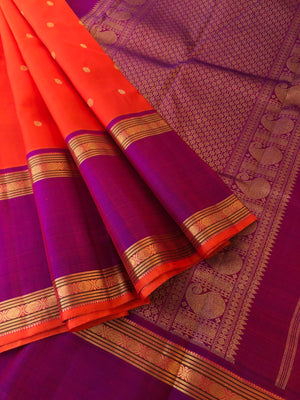 Kamakshi- Traditional Kanchivarams - the best of orange and purple broad borders Kanchivaram with stunning gold zari woven pallu