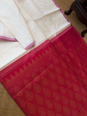 Mohaa borderless Kanchivarams - classy off white with full body pure zari woven tiny paisley buttas with hot pink pallu and buttas woven blouse