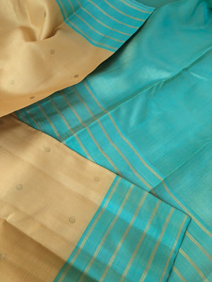 Kaviyam on Kanchivaram - creamy butter tone body with aqua blue pallu and blouse
