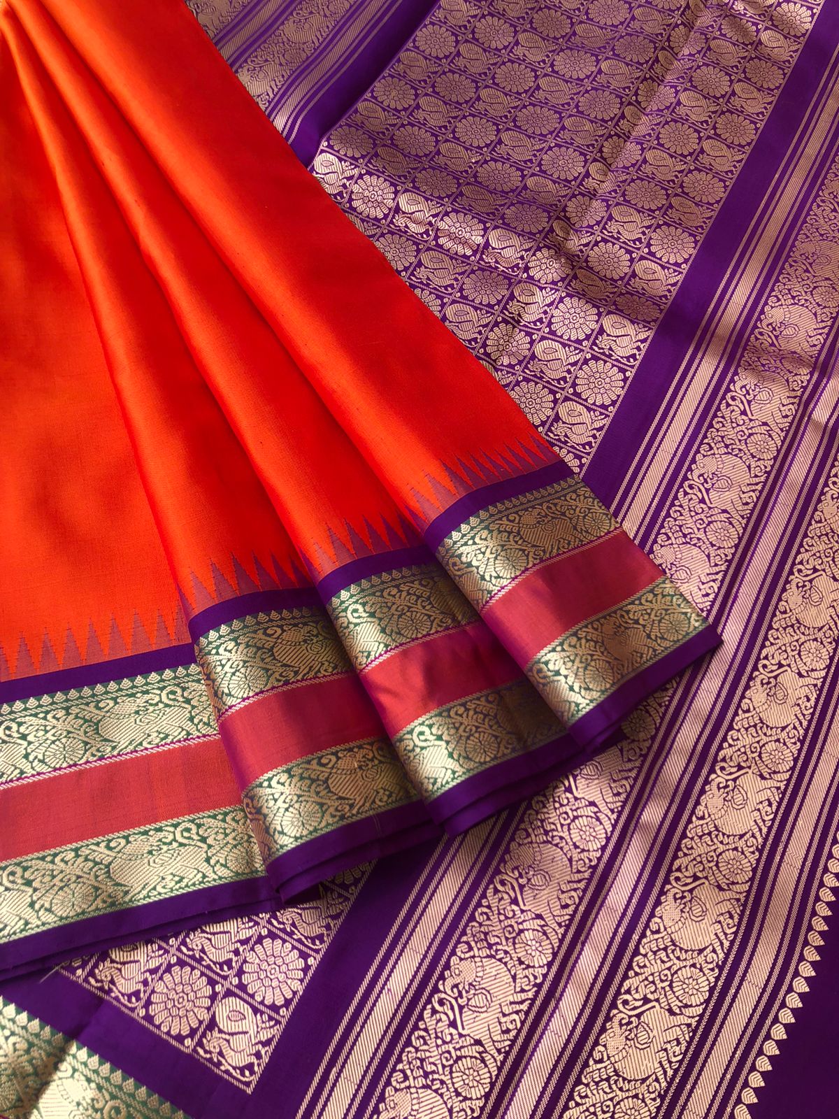 Mohaa- No Zari Kanchivarams - beautiful burnt orange and deep violet yali motifs woven retta pett borders with mayil chackaram concept woven pallu