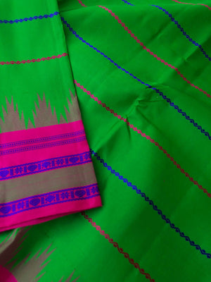 Album of Veldhari Korvai Kanchivaram - gorgeous deep parrot green and rani pink no zari korvai Kanchivaram with neeli kolam veldhari motifs body