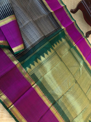 Yarn play on Kanchivaram - black and grey varusai pett with oosi gopuram borders contrasting green pallu and blouse