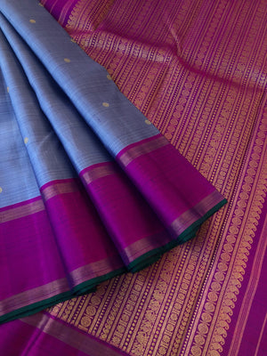Kaviyam on Kanchivaram - blue short steel gray with majenta borders pallu and blouse, the details Over the pallu is the best part