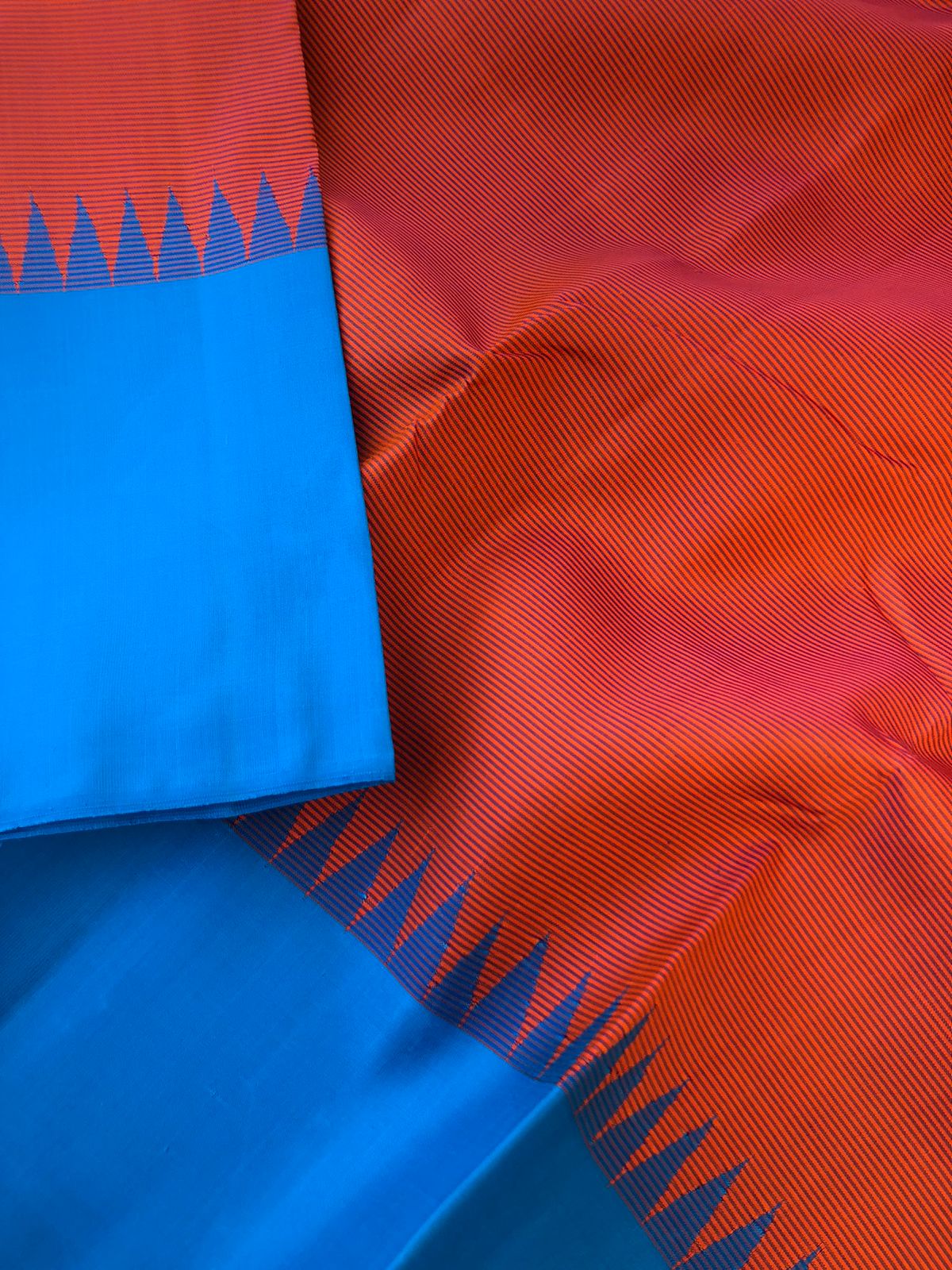 Korvai Vibes on authentic Kanchivaram - gorgeous burnt pink oosi stripes with copper sulphate blue borders pallu and blouse