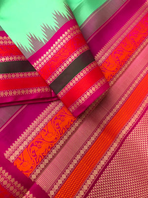 Mohaa- No Zari Kanchivarams - pastel pista ice cream tone body with full thread woven deep pink and orange borders